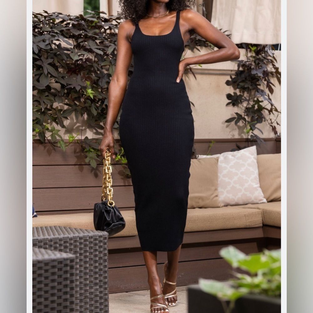 LAURIE DRESS in Black from Byegreis. Size Large.